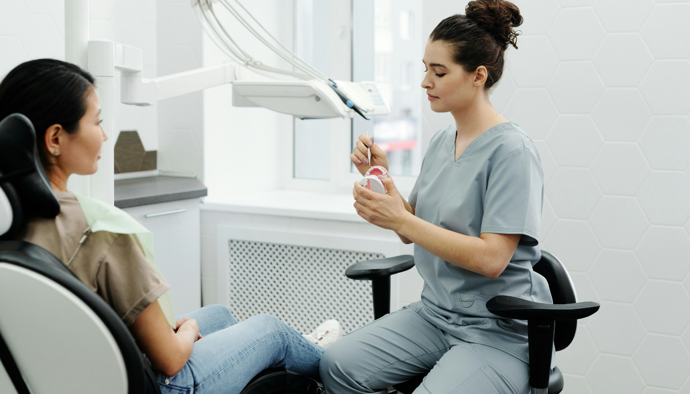winmalee-family-smiles-understand-your-dental-quote Dentist walking a patient through their dental quote, Blue Mountains